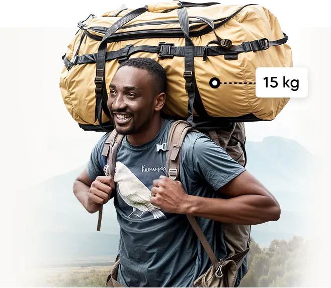 Porteador del Kilimanjaro cargando un bolso de expedición de 15 kg Porteador del Kilimanjaro cargando un bolso de expedición de 15 kg